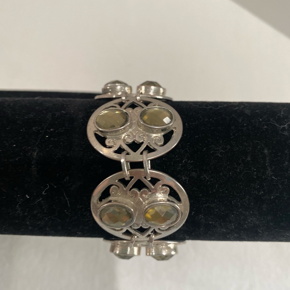 Elegant Silvertone Bracelet with Green Accents